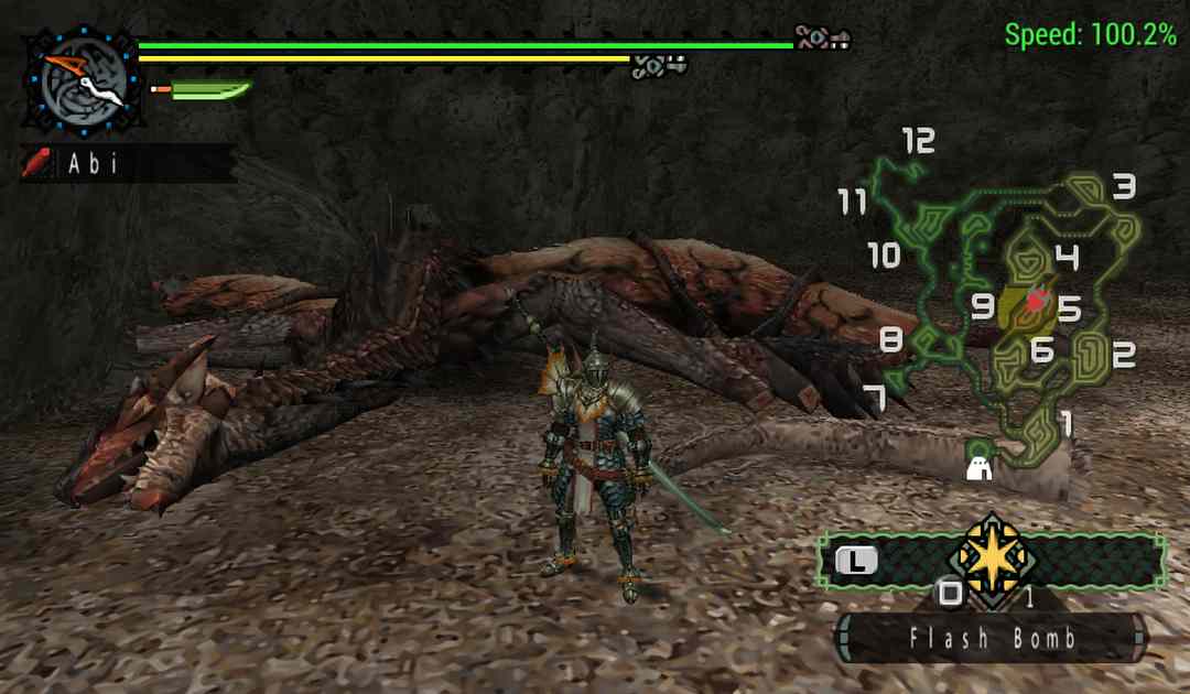 Uno screenshot dal primo Monster Hunter con un Rathalos morto alle spalle di un cacciatore
