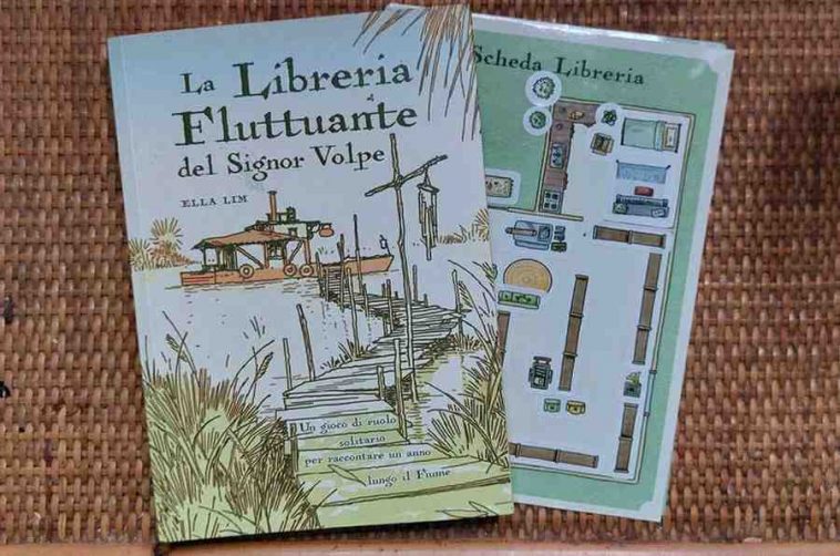 la libreria fluttuante del signor volpe gdr copertina fiume con barca e canne bucoliche